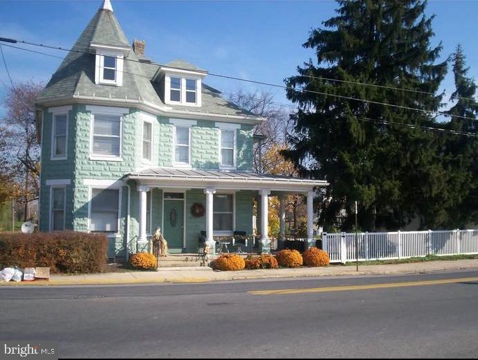 **BRING YOUR OFFER!
This historic charming home in the heart of downtown Shippensburg offers great potential as either an investment property or a future family home! With 4 bedrooms and 1 and 1/2 bathrooms, there’s plenty of space to accommodate a variety of lifestyles. The walk-up attic adds convenient storage, while the full front porch that wraps around the side enhances the home's curb appeal. Constructed entirely of block, the home is built to last for generations. The fully fenced yard is perfect for pets, and a rear driveway provides off-street parking. A shed in the back offers extra storage for tools or gardening supplies.
Currently tenant-occupied with a lease in place through May 2026, the property has been well cared for by its tenants. Whether you're looking for a steady rental or planning ahead for your own move, this home is a solid opportunity.**Tenants pay $2000 per month and all heating/utilities. If move in date is needed before May 2026, please contact listing agent for more information.
