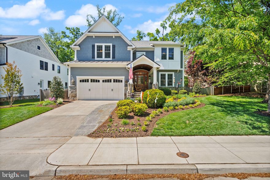 Welcome to 121 Tapawingo Rd SW, a custom-built Fisher home gracefully set on a picturesque, flat .23-acre lot in the heart of Vienna.

Offering nearly 5,000 square feet of thoughtfully designed living space, this 5-bedroom, 4.5-bath residence blends timeless craftsmanship with modern comfort. Rich hardwood floors span the main and upper levels, complemented by custom built-ins, plantation shutters, and woven wood shades that add warmth and architectural interest throughout.

Designed for both everyday living and effortless entertaining, the open-concept layout flows seamlessly from formal to casual spaces. The gourmet kitchen serves as the centerpiece, featuring an oversized island with seating, stainless steel appliances, and a sunlit breakfast area. Just off the oversized two-car garage, a spacious mudroom provides practical organization for today’s busy lifestyle.

Upstairs, the primary suite offers a true retreat, complete with a spa-inspired ensuite bath featuring a soaking tub, expansive walk-in shower, and dual vanities. Three additional bedrooms, each with ensuite bath access.

The lower level is designed for entertaining and relaxation, showcasing a wet bar, custom 200-bottle wine cellar, fifth bedroom, and full bath.

Outdoors, the fully fenced backyard offers a private setting with space to garden, play, or unwind—complete with a dedicated garden area.

Ideally located just moments from downtown Vienna, parks, dining, and commuter routes, this exceptional home delivers the perfect balance of luxury, comfort, and convenience.