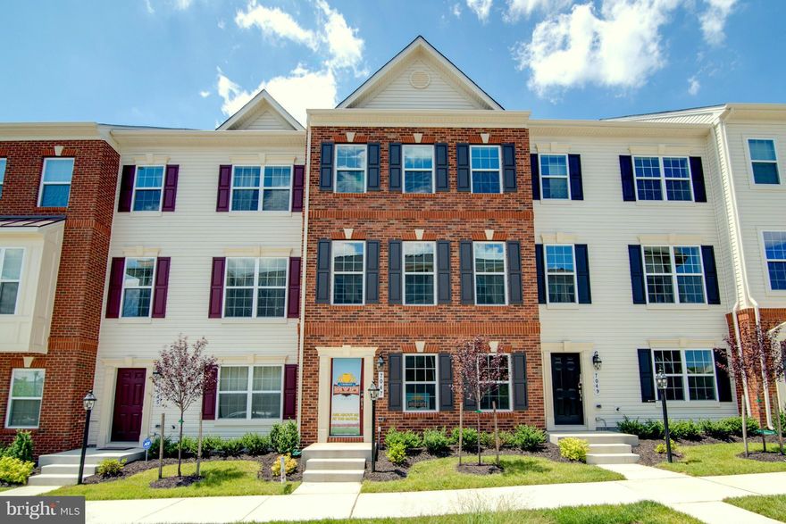 IMMEDIATE DELIVERY!!! LUXURY BRICK FRONT TOWNHOME IN SOUGHT AFTER OXFORD SQUARE*LIGHT FILLED OPEN LAYOUT W/2,400 SQFT(4 LEVELS INCLUDING LOFT & ROOF TOP DECK)*2 CAR REAR GARAGE & DRVWY*HUGE KITCHEN W/GRANITE, SS APLNCS, LARGE ISLAND, GAS RANGE, HARDWD FLRS ON MAIN/LOWER LVLS*LEED CERTIFIED/GREEN LIVING*COMMUNITY OFFERS POOL, 24 HOUR GYM, WALKING TRLS, OPEN SPACE, DOG PARK & SHUTTLE TO MARC,BWI