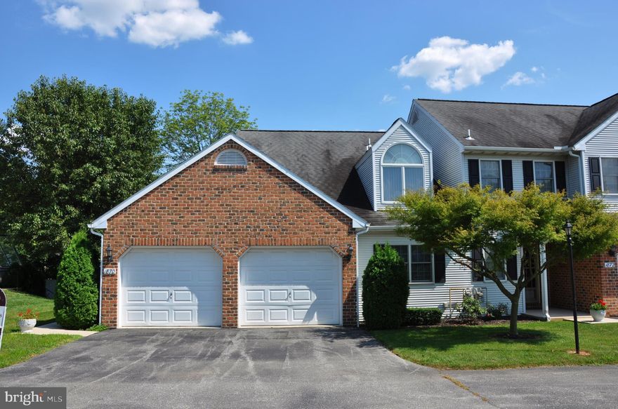 Lots of Character and unique features in this end unit condo in West Manchester Twp. First floor bedroom and bath and 2 loft bedroom areas with master bath/spa.  Gorgeous exposed wood beam sunroom that glows when the morning and afternoon sunlight fills it, or use as a 2nd 1st floor bedroom.  Huge finished walk out basement with workshop area and bench and custom cabinetry. 2 car oversized garage with lots of storage.  This place has it all plus more, and in an extremely convenient location.  Schedule your personal tour today.