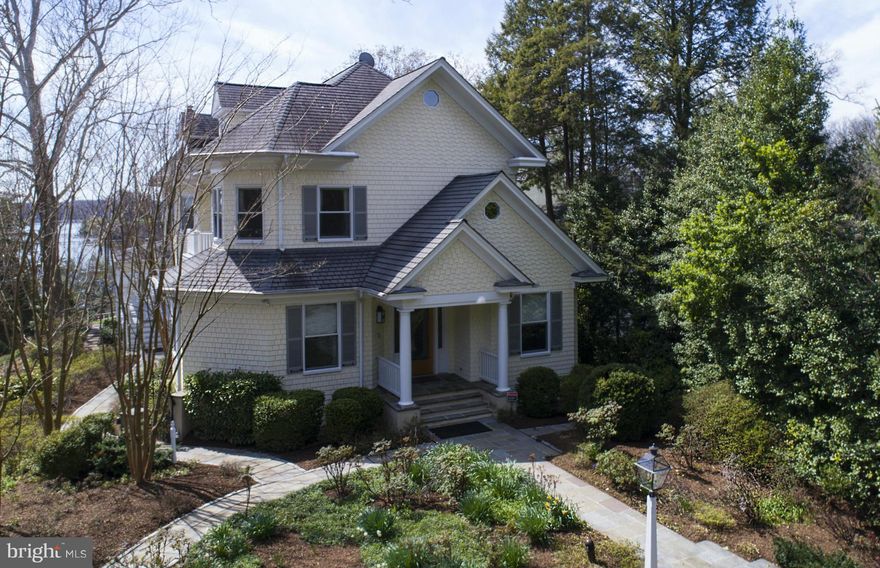 Historic 1920 Victorian overlooking Sullivan Cove in Olde Severna Park. Breathtaking landscape of 1.45 acres & serene water views. Charming and very spacious interior with coffered & tray ceilings, wood floors, built-ins, luxurious & stunning details, expansive views & modern amenities. Wraparound porch, large gourmet kitchen, finished attic, main-level den & library off MBR. Home Sweet Home.