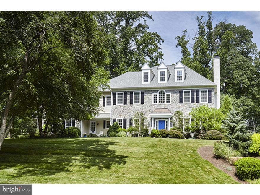 Move right into this better than new, custom crafted stone manor home, majestically set on a private .72 acre lot just minutes from trains, restaurants, renowned schools, shopping, Center City Philadelphia and more.  Impeccably maintained and tastefully improved over the past 10 years, this beautiful residence features sun-filled architectural designs, bright windows, 9' ceiling heights with stunning millwork and moldings, gleaming hardwood floors, warm neutral d cor, gracious room sizes and a wonderful open flow for comfortable living and easy entertaining.  Fabulous Gourmet Kitchen with custom cabinetry, granite counter tops, Wolf range and stainless appliances, bright Breakfast Room, adjacent Family Room with soaring ceilings, palladian window and stone fireplace, library with custom built-ins, sumptuous Master Suite with marble Bath, 5 additional Bedroom Suites including an expansive finished 3rd floor Au Pair Suite, the list goes on.  Absolute move-in condition and just 5 minutes from Bryn Mawr, and Wayne,trains, 20 minutes to Philadelphia International Airport and Center City Philadelphia.