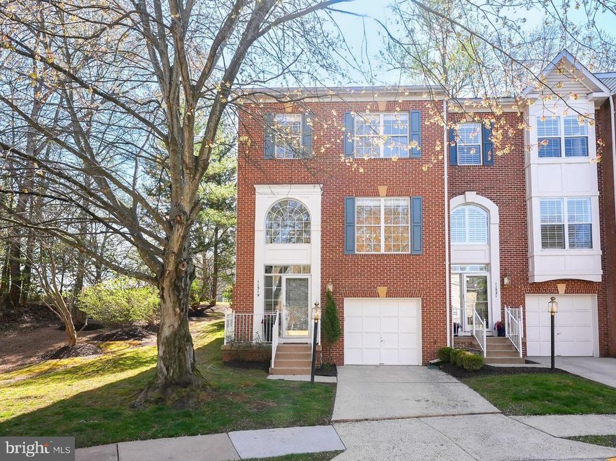 Open Houses are cancelled.  Home is under contract.
WOW!!!  You won't want to miss this renovated townhome which is move-in ready and shows like a model! 

Discover this exceptional brick-front townhome in North Reston, a true rarity in a premier end-unit location. This remarkable home, featuring the coveted Kentwell model, offers approximately 2,090 square feet across three beautifully finished levels. Nestled amidst lush trees and backing onto a common area, it ensures privacy and provides ample parking convenience right in front of the home. Step inside to a grand two-story foyer and an open floor plan, perfect for both relaxation and entertainment. The home is elegantly updated with new light hardwood floors, a newly renovated kitchen featuring white cabinetry, stainless steel appliances, white quartz countertops, and a chic subway tile backsplash. The updated bathrooms, fresh paint, new carpet, and a cozy gas fireplace add to the home's modern charm. The spacious deck offers a tranquil view, while the light-filled walk-up lower level provides additional living space. The updated primary suite is a haven of comfort, boasting vaulted ceilings, a new spectacular chandelier, a custom walk-in closet, and a luxurious bathroom with a tiled glass-enclosed shower, separate soaking tub, dual sink vanity, and more. Additional conveniences include a 1-car garage, driveway, and extra community parking. The HOA maintains the lush landscaping and common areas, enhancing privacy and peace. Plus, enjoy a quick commute to shopping, dining, Reston Town Center, major roads, Dulles Airport, and the Silver Line Metro. Don't miss this fantastic opportunity to own a stunning home in one of Reston's most desirable communities!
Seller reserves the right to accept an offer at anytime.