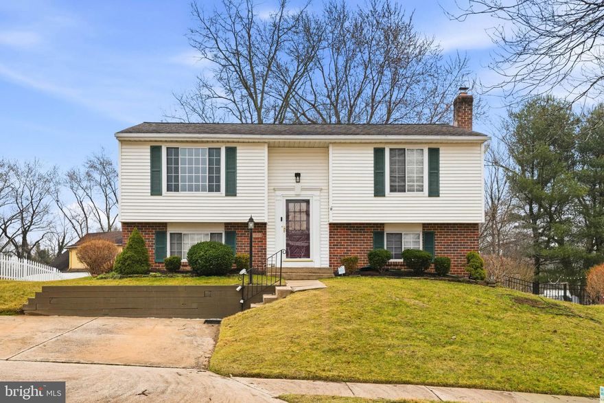 Welcome to this beautiful single-family home in the highly sought-after Ellicott Hills neighborhood of Ellicott City. Located on a cul-de-sac, in a fantastic community within Howard County’s top-rated school district, this home offers comfort, convenience, and A+ move-in-ready appeal.

Step inside to find fresh paint and gleaming hardwood and engineered hardwood flooring throughout, creating a bright and modern feel from the moment you enter. The main level features a spacious living room, dining room, and an updated kitchen, perfect for both everyday living and entertaining. This level also includes two spacious bedrooms and a full bathroom, providing comfortable and functional living space.

The lower level offers additional living space with two more bedrooms and another full bathroom, along with a flexible area that can serve as a family room, recreation space, or home office.

Enjoy outdoor living at its best with a large screened-in porch, ideal for relaxing evenings or hosting friends and family. The home also features an oversized fully fenced backyard with shed, offering privacy and plenty of room for outdoor activities, pets, or gardening. The 2-car driveway is equipped with an EV charger that conveys with the home. Other recent updates include a freshly mulched yard, new microwave in 2025, dishwasher in 2024, refrigerator in 2019 and Roof in 2016 with long life Asphalt Shingles…warranty is transferrable.

Situated on a quiet street in the desirable Ellicott Hills community, this home combines a peaceful residential setting with convenient access to shopping, dining, parks, and major commuter routes.