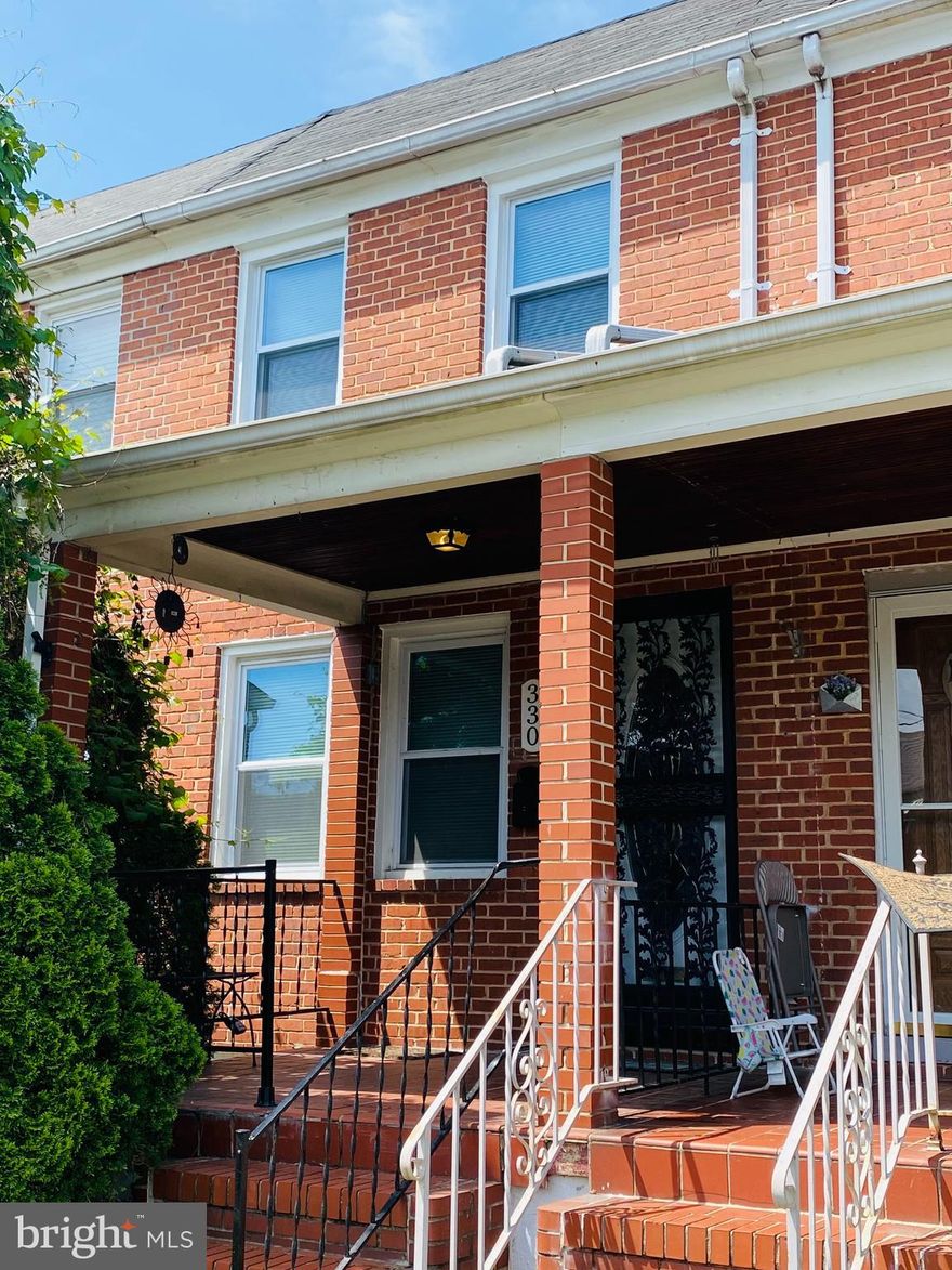 This well maintained 2 Bed / 1.5 Bath redbrick rowhome with covered front porch and rear 2-car parking features hardwood floors throughout main and second level, spacious bedrooms, a large living room and dining room, and improved basement with dedicated utility and laundry room. Close proximity to Johns Hopkins Bayview. Pets on case-by-case basis. Available immediately!