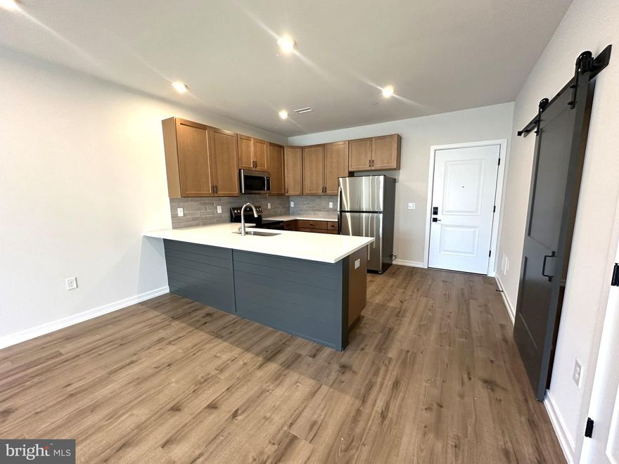 Introducing the pinnacle of suburban luxury and convenience – 409 WEST - new apartments in Chalfont, PA, that offer the perfect blend of modern amenities and warm, comfortable living spaces. Residents can indulge in leisurely walks along the scenic walking trail, unwind on the stamped concrete patio equipped with tables for outdoor gatherings, and pamper their pets at the indoor dog wash station. The private and serene picnic area is magnificent and you will love having access from inside the community.

Inside, a sophisticated lounge offers a perfect retreat, while the state-of-the-art fitness facility caters to active lifestyles. Additional conveniences include an indoor package room for secure deliveries, indoor and outdoor security cameras, smart digital access controls, and an on-site leasing office for seamless assistance.

Chalfont is celebrated for its exceptionally low crime rate and top-tier schools, making it a sanctuary for families seeking peace without compromising on educational excellence. Conveniently located just minutes from Children’s Hospital, Delaware Valley College, and Gwynedd Mercy College, your new home at 409 WEST promises a commute that is as effortless as it is enjoyable. The diverse attractions of Doylestown – from eclectic shopping and dining experiences to vibrant nightlife and a rich arts scene, including multiple museums and an independent theater – lie just moments away. Philadelphia itself is a brief journey from your doorstep. The Chalfont SEPTA station is a six-minute drive away and offers a direct route into Center City.

The commercial shops along Butler Avenue offer local gems like The Talking Teacup, Brown’s Doughnut & Pastry Co, Spatola’s Pizza, and the Bagel Barn Café, as well as Giant Supermarket at New Britain Village Square. Montgomeryville, with Wegmans, Montgomery Square and Airport Square Shopping Centers, is less than a ten-minute drive away. At 409 WEST we invite you to step into a world where luxury living meets unparalleled convenience. Welcome home.

Tenants are responsible for electric, gas, water, and cable/internet in addition to rent each month. Dogs permitted with $500 deposit! Sorry, no cats permitted.

Application Qualifications: Minimum monthly income 3 times the tenant’s portion of the monthly rent, acceptable rental history, acceptable credit history and acceptable criminal history. More specific information provided with the application.