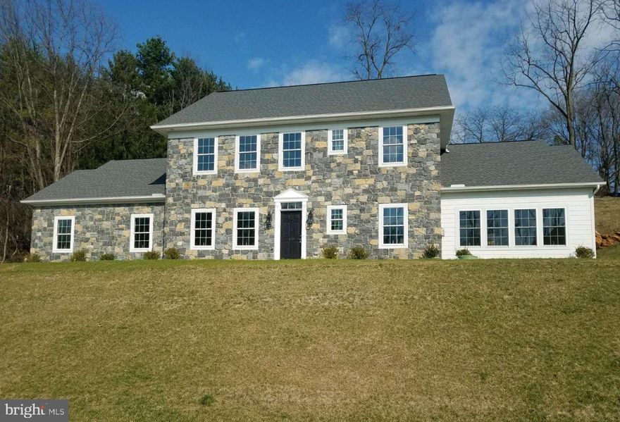 STUNNING NATURAL STONE EXTERIOR This newly constructed home features Historic Colonial Architecture with a modern design and is located in the Guilford Hills area of Chambersburg, PA. It is just minutes from shopping, restaurants, schools, Interstate 81, Penn National Golf Course, Guilford pool, Norlo park and hiking in Caledonia State Park. This home has 4 bedrooms, 4 bathrooms, 1st floor office and 2nd floor bonus area. Enjoy your open great room that includes kitchen with granite counter tops, dining area and living room with vaulted ceiling and lots of natural light. The primary bedroom is located on the first floor. There are laundry rooms with linen storage on the 1st and 2nd floor. Extra deep two car garage with large storage area. Fireplace, wide vinyl plank flooring, storage under stairs, breakfast bar, 9’ ceiling height on 1st floor, recessed lighting, double pane tilt Pella Brand windows and many other upgrades. A grand two story foyer with open stained oak staircase will greet visitors at your front door. Must see...schedule your showing today!!