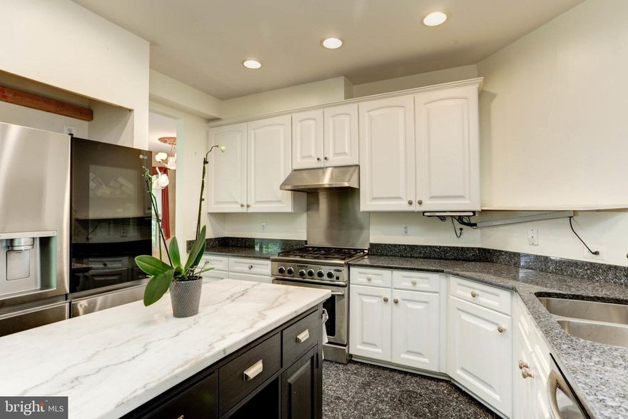 LOCATION, LOCATION, LOCATION!!  This part of the community is the absolute best!  If you look around at other homes in Governors Grant, you'll see there are always parking issues on the other side of the neighborhood.  You'll be so grateful to be on the side that this home is located, as it always has plenty of guest parking, plus it's an extremely private location in the community!  There are some incredible upgrades awaiting you.  The light fixtures are top notch, the appliances are stainless steel and high-end, the crown molding is unlike any you've seen before, the wood floors are custom, the countertops are upgraded, there is incredible tile work in many rooms of the home - the alabaster light fixture alone cost $20,000 to purchase and install.  There are even two Rembrandt replicas that will convey with the home!  The larger of the two was $60,000, the other was $40,000.  The Italian marble surround for the fireplace was actually imported from Italy and cost $60,000 to purchase, ship and install.  You're simply not going to find a home quite like this!  Moving to the outside of the home:  As mentioned earlier, the lot location is the most desired in the neighborhood.  It offers the most privacy, has a community fence to separate the green space, and there's TONS of parking.   No where else in the neighborhood offers an abundance of parking.  Did we mention that you don't need to do any landscaping or snow removal?  Because you don't!  It's all included!  Don't miss out on this once in a lifetime opportunity!!