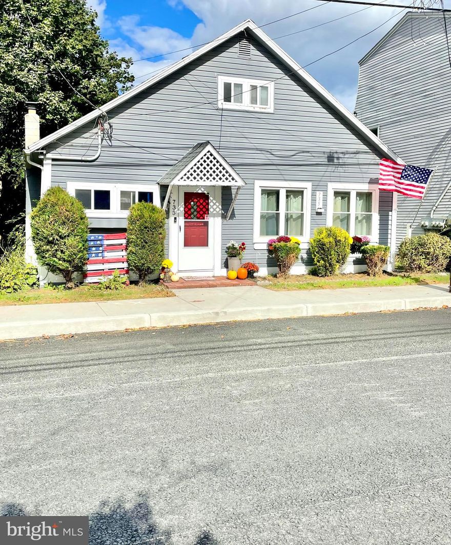 735 Main offers tons of charm in the newly paved portion of town. Originating as an ice cream parlor to the Borough in the 1900s, it later transitioned into a residential home boasting four bedrooms and two full bathrooms. Entering the home, you are met with a large living room area featuring built-in bookshelves and a large kitchen equipped with stainless steel appliances and lots of cabinet space. On the first floor you will also find a separate dining area, two bedrooms, and a full bath.  Head upstairs to an additional two bedrooms, full bath, laundry area, and additional storage closets.  Enjoy the fenced in backyard with both peach and apples trees that bear delicious fruit and plenty of room for outdoor entertainment. Off street driveway parking, additional parking from back alley access, and newly replaced sidewalks are also a huge bonus to what this home has to offer! This home is ready for your personal touches! Schedule your private showing today!