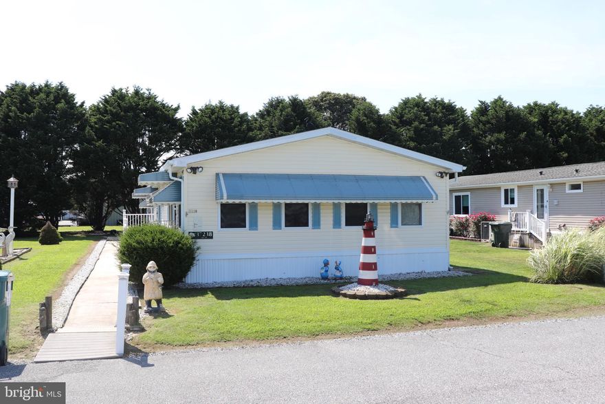 Welcome to 37238 Sugar Hill Way, a large 4 Bedroom 2 Bath home only about 3 miles from the beach! This mostly furnished home has 2 living areas, a large kitchen/dining area, a large primary bedroom with a full bath and 3 other good sized bedrooms. Recent upgrades include new A/C and water heater in 2022. There is also an addition with a 3rd shower. Outside there is an oversized shed with electric giving plenty of room for all of your beach toys. There is also a boat ramp with easy access to the bay for a small annual fee. This home is close to the beach, bay, shopping, restaurants, golf and Freemen Arts Pavilion, which hosts national acts during their Summer Concert Series. Rentals are not allowed in this community.