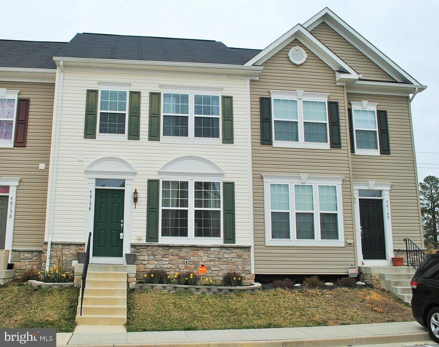 This is a huge townhouse with great big rooms and close to everything that is important.  Location, location, location.  The bump outs in this unit makes it a very special cozy home.  Why wait to have one built and when you can just move in with a already finished basement with an added extra bonus room that can be used as a office or another bedroom for a guest with full bathroom.  Close to PAX