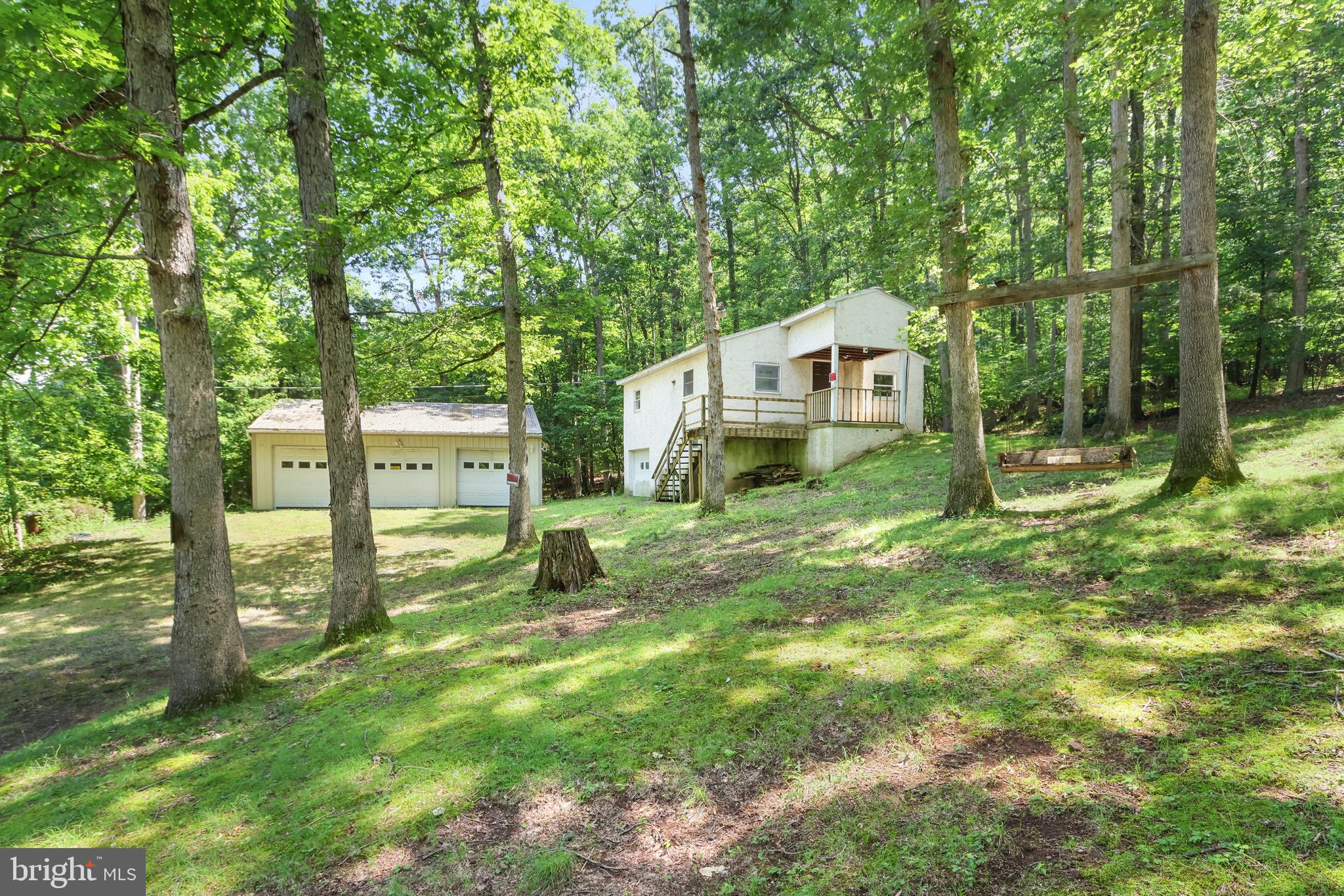 Incredible potential at this 5.7 acre property for sale, with a 1 bedroom ranch home PLUS second foundation with SEPARATE well/septic. Three car detached pole barn garage with electric. The home renovations have been started for you to complete, with new floors, kitchen and bath. Walk out basement Storage shed in between two home areas. The driveway splits off to the right side where you'll find the 2nd foundation from the previous home that has a second well and septic. And a large storage shed in between. See Survey Map and Inquire for possible multi-dwelling uses. Ask how to receive a $4,000 lender credit towards closing costs or lowering your interest rate!