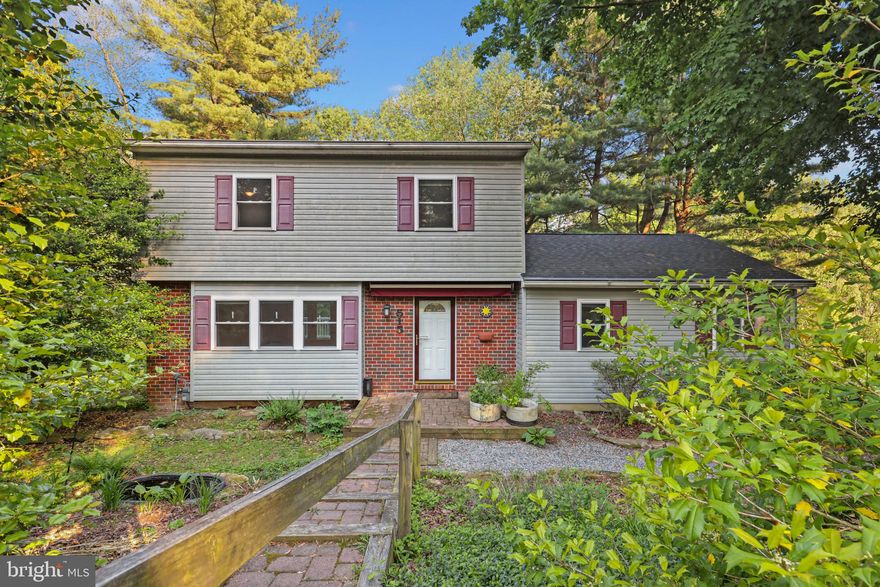 WELCOME  HOME TO 515 FOREST VALLEY DRIVE TUCKED AWAY ON A WOODED CORNER LOT IN THE QUAINT FOREST HILLS NEIGHBORHOOD. THE MAIN LEVEL BOASTS GLEAMING HARDWOODS THROUGHOUT, SPACIOUS LIVING, DINING  COMBO ADJACENT TO KITCHEN W/ STAINLESS STEEL APPLIANCES W/ WALK OUT TO ROOMY DECK W/ PICTURESQUE VIEWS OF PEACEFUL WOODED SURROUNDINGS. BONUS ROOM ON MAIN LEVEL ADJOINS FULL BATH PLUS WASHER/DRYER HOOK UP PERFECT FOR MAIN LEVEL LIVING. UPPER LEVEL HAS THREE LARGE BEDROOMS W/ FULL BATH. LOWER LEVEL IS PARTIALLY FINISHED WITH WALK OUT TO PATIO, PLUS STORAGE AND UNDERGROUND GARAGE W/ WORRK SHOP. WHOLE HOUSE GENERATOR. WASHER/DRYER HOOKS UP EVERY LEVEL FOR MAXIMUM CONVENIENCE. THIS HOME IS READY FOR YOU TO MAKE IT YOUR OWN.