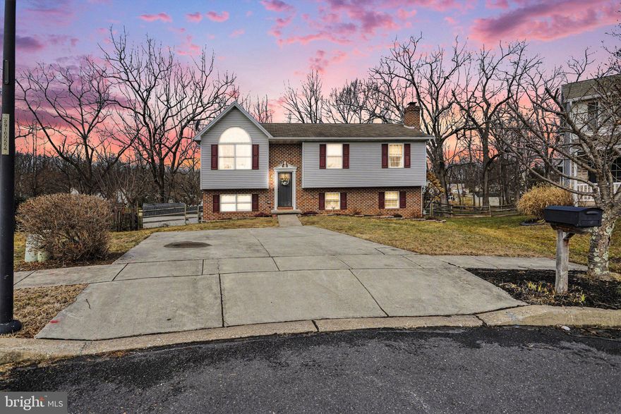 Welcome home to this beautifully maintained 3-bedroom, 2.5-bath split foyer home situated on a desirable cul-de-sac lot in Littlestown School District. The main floor features a bright and open floor plan with cathedral ceilings and beautiful bamboo flooring. The updated eat-in kitchen features granite countertops, stainless steel appliances, and a seamless flow into the dining and living areas. The owner's suite features double closets and a beautifully updated ensuite bathroom with a walk-in tile shower. Two additional bedrooms and a full bath complete the main level. The lower level offers even more living space including a versatile bonus room that could be used as a 4th bedroom, office, or gym, a half bathroom, and a generously sized family room with a wood burning fireplace perfect for family gatherings and entertaining. The home boasts new flooring throughout, a new hot water heater installed in 2023, and a new furnace was just installed in December 2025. Outdoors features a fenced-in rear yard, a deck, and a large patio for outdoor enjoyment. Conveniently located close to all Littlestown amenities, Gettysburg, Hanover, and the PA/MD line. Schedule your private tour today!