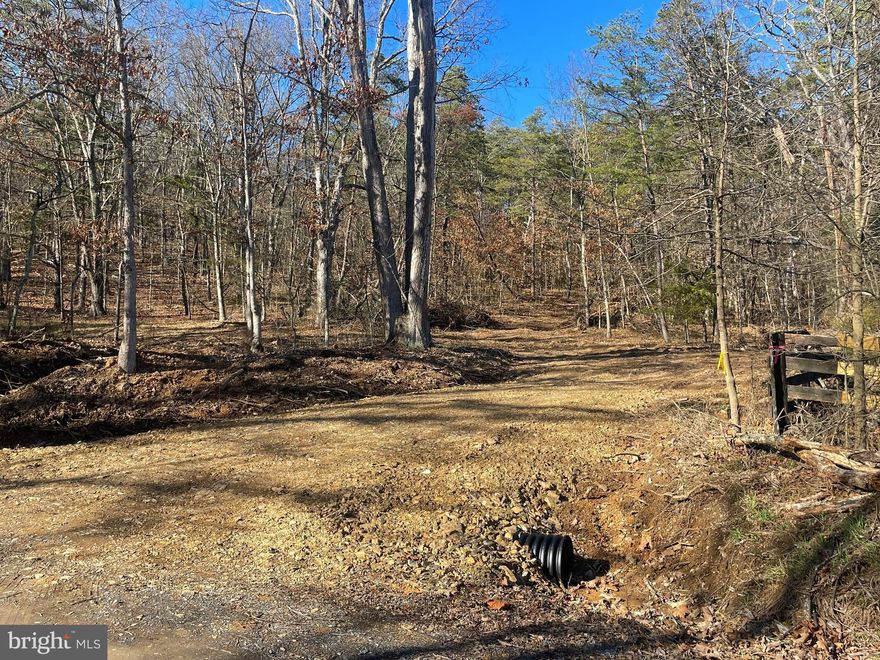 Who wouldn't want it all? Privacy and seclusion, but only minutes from schools, restaurants, and town! Whether your building your dream home or your weekend getaway, this one checks all the boxes! 5+ unrestricted acres, perc approved septic, new driveway, and right off a state maintained road! What more could you ask for?  These types of lots do not come along often so do not miss you chance to come and escape the city life and grab your piece of West Virginia! Only 45 minutes from Winchester VA and two hours from DC!