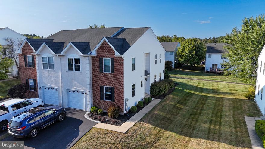 This Gorgeous Turnkey Townhome is sure to impress. This home is better than new with a recent first floor remodel, new floors, kitchen, fixtures and beautiful lighting (2019). The alluring grand two story foyer w/wood floors. large open great room and gas fireplace. Everything is clean and bright! The 2nd floor has a spacious hallway and is bright and inviting to every bedroom and the convienence of 2nd floor laundry.   The large master bedroom has a sitting room or could be a small office. The Master bath was just done (June 2024)  and offers a walk-in shower you will love. Plenty closet space, ceiling fans and bright windows and upgraded blinds and treatments. The lower level is newly finished (June 2023) with a playroom and entertainment area. Plenty storage with new efficient HVAC (Ded 2022)The 17 x 14 deck which overlooks a walking trail is freshly stained and well shaded. Enjoy extra driveway parking and plenty street parking.  Other updates include: Hall bath, February 2018, Hot water heater, February 2021, New sub pump with battery back up March 2021, Windows (about half of them) May 2022, Gutters April 2023, Garage door opener, July 2023. Its all been done!  The neighborhood also features 2 tot lots.  This home is for YOU! Schedule your appointment today! Owner is a licensed agent