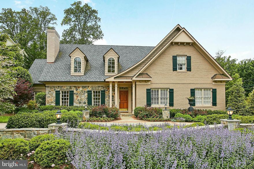 Innovatively designed, energy efficient impressive Stone/Brick Cape Cod custom built by J L Albrittain is the perfect fit if you are seeking one-level living yet want separate spaces for family & guests. Skylighted ceilings impeccable detailing QUALITY wine cellar 3 car side load garage private patio landscape lighting Truly stunning! Easy to own in the best neighborhood in town!