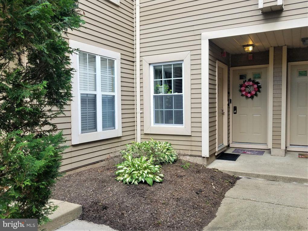 FOR RENT - Meticulously maintained and updated, this first-floor condo in Newtown Grant’s Society Place is sure to please! Located in the award-winning Council Rock School District, this 2 bed, 1 bath condo features spacious one floor living, convenient parking and so much more! Your kitchen features stainless steel appliances, built in microwave, gas cooking, granite countertop, updated cabinets, and breakfast bar area. Your dining and living room areas are flush with natural light, laminate flooring and sliding glass doors to your covered patio. The primary bedroom features laminate, ceiling fan and walk-in closet. The hall bath has been updated with tile flooring and vanity. The second nice sized bedroom and laundry rounds out the living space. This home also features newer windows, ample parking, gas heat and cooking as well as an outdoor storage closet. The community also has full access to Newtown Grant’s recreation facilities which include a baseball field, basketball courts, tennis courts, volleyball, community pool and more! The community fees cover your lawn care, snow removal, trash removal leaving you with truly low maintenance living with amenities galore. This won’t last long- make your appointment today to view this wonderful condo!