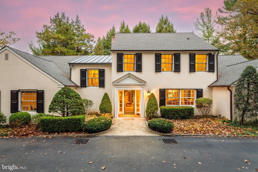 North Bryn Mawr treasure. Gracious street presence sets the stage for a pristine interior, renovated completely to the finest modern standards. Tucked on a quiet circular street with no through traffic, yet minutes to Bryn Mawr town center and train station, this location offers a rare combination of privacy and convenience. No cost was spared when this home was pulled to the studs and renovated by Orion in 2004. That work included: roof, all windows and doors, kitchen, all bathrooms, designing an extensive master suite, all copper pipes installed, hardwood floors throughout, HVAC,  the addition of an extra bedroom over the master, dormers to expand living space, two small copper roofs, copper gutters and downspouts, asphalt roof, finished basement and more. The extensive reimagination resulted in the perfect combination of an open flowing floor plan while preserving the most loved formal spaces. A gourmet, eat-in kitchen with a large island and the finest appliances opens to a cozy family room with built-in shelves and fireplace with french doors to the flagstone terrace. A formal living room with a second fireplace is finished with a wet bar and french doors to the flagstone terrace. The formal dining room is perfect for entertaining. Beautiful hardwood floors run throughout and an airy, two story foyer brings glorious light into the home. His and her formal offices lead to a sought after first floor master suite with his/her walk-in closets, laundry, and sumptuous master bath. Upstairs, three additional bedrooms, one with en-suite bath, and  two sharing a large second full bath, are connected by  another large living space. A finished basement with a full bath allows ample space for a playroom and gym. Two car garage, one garage bay  has additional tandem space to fit a sports car as well plenty of storage. Minutes from downtown Bryn Mawr, which offers many of the finest shops and restaurants on the Main Line, as well as beloved Ludington Library. Award-wining Lower Merion School District.  Commuters’ dream with easy access to major roadways.