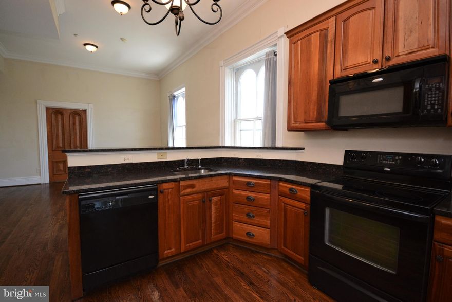 Great 1 bedroom condo with den. Overlooking Downtown Hagerstown and adjacent to Hagerstown City Park. Condo offers granite counters, cherry cabinets, breakfast bar, open floor plan, 10x17 deck overlooking north end of City park, separate 400 cubic feet of storage, bath with tile floors. In-unit laundry. Gated community with off-street parking.