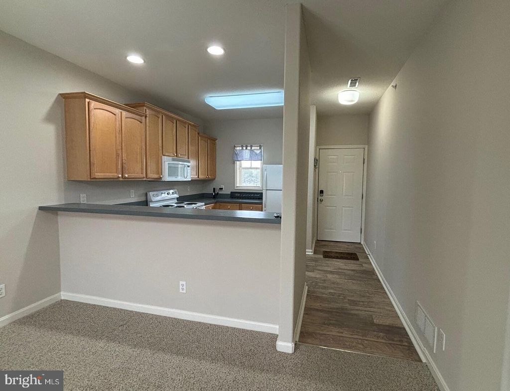 Photo of 33156 N Village Loop #4304, LEWES, DE 19958 (MLS # DESU2111594)