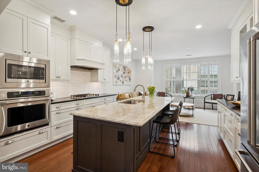 You do not want to miss this fabulous townhome!  This 4 bedroom, 4.5 bath townhome is in the desirable Jardin Community of Wayne which consists of  6 beautifully maintained properties.  This townhome has everything you need to just move in and start enjoying!  Built by the well known  C.F. Holloway,  this home includes detailed millwork, high ceilings, a private bathroom for each of the four bedrooms, an open concept, convenient laundry room and even an elevator.  You enter the home and immediately are impressed with the 2 story foyer, beautiful molding and hardwood floors.  The lower level consist of cubbies, an office/bonus room/4th bedroom with an ensuite bath and a patio.  As you ascend up the staircase you notice the abundance of natural light in the home.  The living room boasts  built ins, a gas fireplace and a slider out to the private covered patio.  This patio is the perfect spot for morning coffee or an evening drink.  The kitchen, dining and sitting area are perfect for entertaining .  The open concept allows for large gatherings of family and friends.  The kitchen has gorgeous cabinets, a large center island, tile backsplash and high quality appliances including a new dishwasher.    The sitting area is also full of natural light from the wall of windows and includes an attractive build ins desk.  A walk in pantry and powder room complete this level. The next level features the primary bedroom with a luxurious en-suite bathroom with double vanity, soaking tub and a private water closet.  The primary suite also boasts a custom walk-in closet designed by California Closets.  The second bedroom on this level is very spacious with a white tiled en suite bathroom.  The 2nd floor laundry room with cabinet and a utility tub  make laundry very convenient.  The top floor consists of the 3rd bedroom with en suite bath.  This home has everything there is to offer.  The elevator makes it easily accessible for older relatives or friends.  The entire home has been freshly painted, all new carpets in the bedrooms and the stair runner, new dishwasher, new washer/dryer, new updated security system, and includes all the TV's.  The home is the perfect location for walk to Wayne, Radnor Trail and all the restaurants and stores in Wayne.  Easy access to the blue route and train.  A fabulous property to call home!