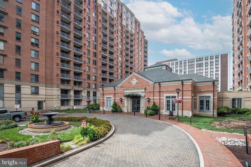 MULTIPLE OFFERS RECEIVED! OPEN HOUSE IS CANCELED. Welcome home to this gorgeous 2 bedroom/2 bathroom CORNER unit at The Gallery at White Flint Place! Step inside to this light and bright open concept floor plan to find over 1,306 sq. ft. of luxurious living space. This unit boasts upgraded Brazilian cherry hardwood floors throughout, an updated galley kitchen with an eat-in bar/peninsula, top of the line stainless steel appliances, and ample cabinet/counter space with a gorgeous backsplash with undercabinet lighting. Off of the kitchen is the family room with a generous designated dining area, perfect for hosting dinners while overlooking the incredible views as they wrap around the unit. Also found in the family room is a generously sized balcony with sliding glass doors, spacious enough to fit outdoor seating and a table. Back inside the unit, the primary bedroom features a walk-in closet in addition to a standard closet, both with built-ins throughout, plus an ensuite bathroom with a large vanity, linen closet, and fully tiled standing shower with glass door. In the secondary bedroom, enjoy a large wall to wall built-in desk/office unit, plus a large closet. The second bathroom of the unit is right next to the secondary bedroom, offering direct access to not only the bedroom but the common area as well - this bathroom features a glass door shower with an integrated bathtub. Some additional features that separates this amazing condo is the in-unit washer/dryer, stackable and found stowed away in a closet, plus a gas fireplace in the living area, in-building storage unit, and an assigned garage parking space (steps from elevator)! The amenities are quite extensive, featuring a 24-hour concierge, outdoor swimming pool, fitness center, meeting room, party room, community lounge with WiFi, and more. Location, location, location - ideally situated one block block from Grosvenor METRO, 24/7 Harris Teeter, Pike & Rose (shopping/restaurants), iPic movie theater, and only minutes from Rockville, Downtown Bethesda, and I-495/I-270. Seller reserves right to accept any offer at any time.