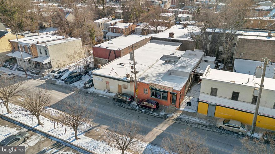 This expansive 14,772 SF commercial flex building  is a prime redevelopment opportunity in the heart of Germantown. Located on a 16,625 SF multi-parcel lot, the structure features high-volume warehouse space with a functional loading dock, private parking, and a ramp providing access to substantial underground storage. Positioned directly across from Freedom Square Shopping Center and just steps from the Germantown Avenue corridor, the site benefits from high visibility and proximity to La Salle University, Wayne Junction Station, and local anchors like Uncle Bobbie's Coffee & Books. Zoned CMX-2.5, this property is a versatile "blank canvas" ideal for creative office space, high-capacity storage, or a reimagined retail/event venue. While the building requires maintenance and repairs, it remains structurally sound and provides a high-value canvas for retail or event space conversion. This ideally located asset is priced to sell, offering immense potential for the right investor to revitalize a substantial footprint in a high-traffic area. This property being sold in as-is where-is condition.