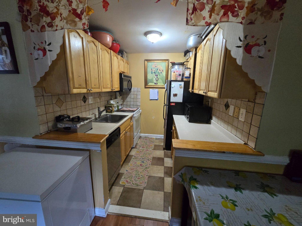 Photo of 7492 Princess Carol Court #9, MANASSAS, VA 20111 (MLS # VAPW2130354)