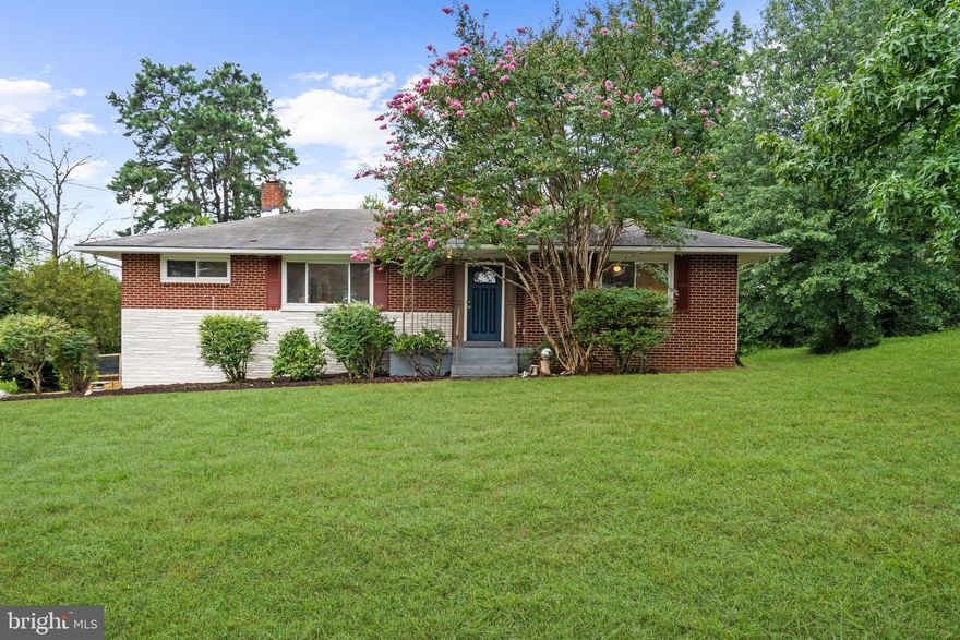 DOUBLE LOT! This updated & spacious rambler sits on a flat, double lot, featuring a total of .6 acres, solid oak floors, a brand new bathroom with double sinks, a massive rear deck (est. 574 SF!) and garage (est. 524 SF!). The bedrooms are all amply sized with large windows. The LL is currently Open Plan but a 4th bedroom could easily be created in existing space. Abundant storage includes pull-down attic access, spacious utility & laundry rooms, and a large crawl space off the laundry room. Plus the gigantic garage is a mechanic or carpenter’s delight! You might think you’re on a farm when you look outside, surrounded by grass and large garden beds - this home truly gives plenty of space to play and enjoy life outdoors! 

The current owner has upgraded this home in many ways. The main level bathroom just got an extensive remodel, including new soaking tub (completely re-framed), floor & wall tile, conversion to double sink vanity, and new sink/bath fixtures. A/C 2023. Kitchen appliances 2023. Other recent updates include: 2 large raised garden beds filled with $1,000 of fresh, composted dirt; New tree garden along back fence, Resurfaced and waterproofed deck over garage; Refinished entire garage and added new windows & framing; Removed old oil tank; Labeled electrical panel; and many more! Also, the entire home was just painted, including the front and back doors. 

NOTE: Sale includes 11520 Old Baltimore Pike (.164 acres) and 11524 Old Baltimore Pike (.44 acres). Survey is in Docs.