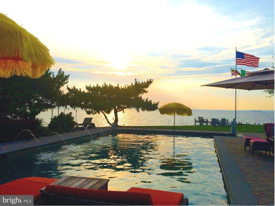 Big sunset views and close proximity to Annapolis! Just off the first BayBridge exit, this home boasts gorgeous NEW Baths,Hardscape, Pool, Hardiplank Siding, Roof,HVAC, Paint, Carpet,Outdoor Lighting and more!! Beautiful GUEST HOUSE with kitchen, living rm, BR!! Neighborhood enjoys marina,park,bike path. You'll never want to leave!