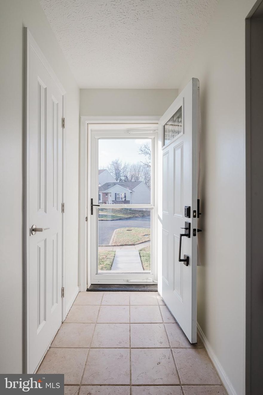 Welcome to 2813 Meredith Court, in the sought-after Box Hill North Community - feeding to Patterson Mill Middle and High Schools. This renovated end of group townhome is sure to impress! The eat-in kitchen with bay window has black stainless steel appliances, a pantry and a pass through to the dining room. The dining room has hardwood flooring that flow into the sunken living room with recessed lighting. There are sliders to the fenced rear yard with patio. You'll find a powder room to complete this level. Upstairs, the primary suite has ample closet space, cathedral ceiling and attached/renovated primary bathroom. There are two additional bedrooms along with a renovated full bathroom in the hall. The lower level is also finished with large family room with recessed lighting, storage and laundry room. Other updates include a whole house filter, newer HVAC and water heater. There are two assigned parking spaces with this unit and pool membership available.