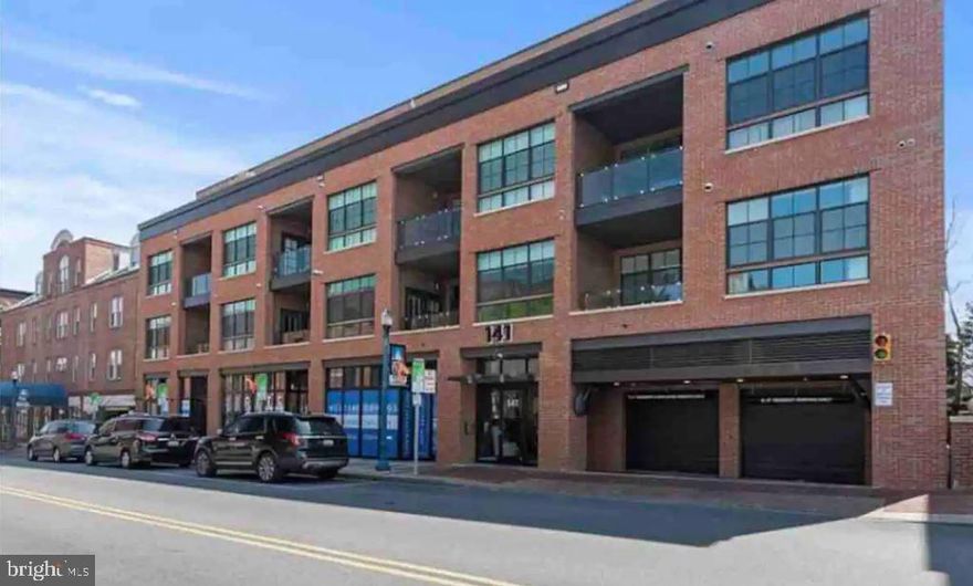 It is always about location, and the beautifully situated 141 West Street is in the perfect location to enjoy all that Annapolis has to offer.  Right outside your door you'll find fabulous restaurants, Maryland Hall, the art district and so much more.  This beautiful Bozzuto building was completed in 2020, it has a very inviting lobby and garage parking.  This fabulous 2 bedroom, 2 bath unit with hardwoods throughout offers a turn key way of living with the ability to be in the heart of things, while also having your beautiful unit to tuck into.  The kitchen is the heart of this condo, with a large island, perfect for prepping meals or gathering with your family and friends.  The living room has a large window allowing for a lot of natural light to flood the unit.  Right off the living room and primary suite is a very inviting patio overlooking the lovely surrounds of the community.  The patio is absolutely perfect for enjoying outdoor living and dining.  Bonus with living in this incredible building, it offers front row seating at all of the parades as they step off heading down West Street.