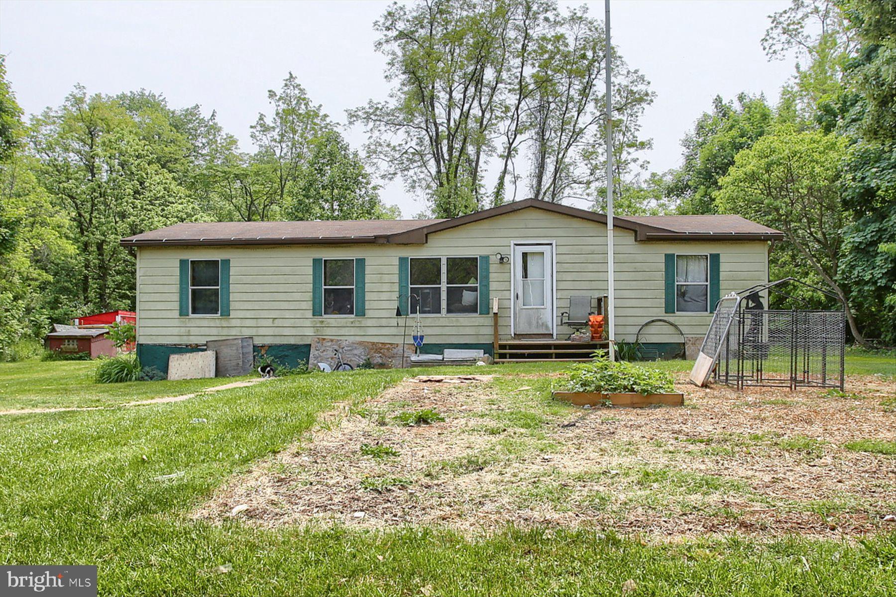 Introducing 464 Ridge Road, an exceptional investment opportunity nestled on a spacious 1.53-acre corner lot. Located in the West Shore School District, this property offers a myriad of possibilities for savvy investors seeking valuable returns.

One of the standout features of this property is the convenience of a private well and septic system, ensuring self-sustainability and efficient utility management. The existing 3-bedroom, 2-bathroom manufactured home on site is an added bonus, Currently occupied by a reliable tenant, presenting an immediate income stream for the discerning investor.

Surrounded by picturesque natural beauty, the property offers a serene and tranquil setting, perfect for those seeking a peaceful retreat or a potential rental property. The generous lot size provides ample space for future expansion, making it ideal for potential development or customization to suit your investment goals.

Don't miss this extraordinary opportunity to secure an investment with immediate returns and endless potential. Embrace the possibilities and make 464 Ridge Road your gateway to success in the world of real estate investment. Contact us today to schedule a viewing and explore the vast potential this property has to offer.