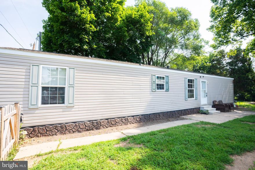 Welcome to 92 Edsel Avenue in Martinsburg, WV! This lovingly cared for 3 bedroom, 1 bathroom home offers comfort, convenience, and value, perfect for first time homeowners. Featuring a spacious yard, two private entrances, and a fresh list of upgrades, this home is move-in ready.

Recent Upgrades Include:
• Newer roof (3 years)
• New HVAC system
• New luxury vinyl plank (LVP) flooring
• New hot water heater
• New concrete steps
• Fire pit
• Built-in microwave

Enjoy life outdoors just up the road from Opequon Creek, perfect for kayaking, fishing, and swimming. You’re also less than 10 miles from Orr’s Farm Market and Barnyard, and just 8 minutes from the Martinsburg Train Station, providing easy commuter access. Dining and shopping options are plentiful; Chili’s, Olive Garden, Panera, and Kobe Japanese Steakhouse are all within a 5 mile radius.

This home is a rare find in a growing area. Schedule your tour today! 

Please note: The Lot Rent is $300 and homeowner's need to apply with the mobile home community.