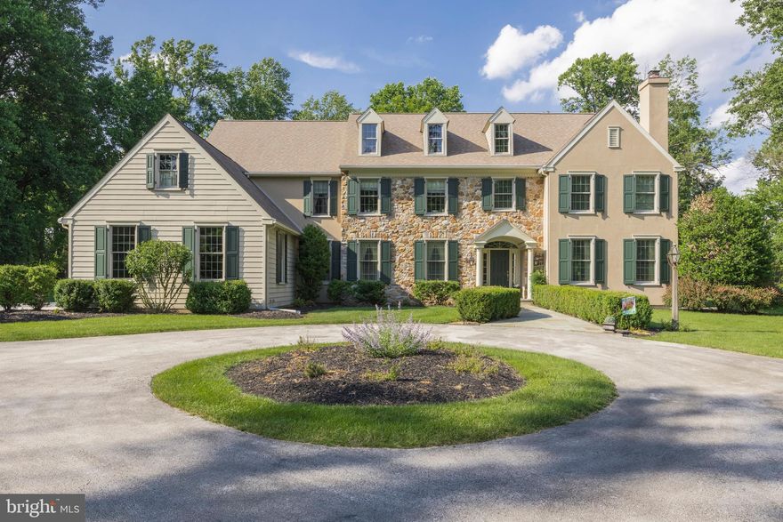 This fabulous Malvern built center hall colonial located in the Briarwood Community (developed by Chip Vaughan and Lee Haller), is the perfect place for entertaining.  This exquisite home sits on 5 secluded acres and offers over 6,600 square feet of living space.  You will always look forward to coming home to tranquility and privacy,  all the while being only minutes from schools, shopping, major commuting routes,etc.  Enter into the grand two-story open foyer with unobstructed views of the expansive patio and private rear yard.  Entertaining will be a breeze with dinner in the large, formal dining room to your left with an inviting living room to your right, complete with gas fireplace.  French doors lead into the office/den with a full wall of windows overlooking the professionally designed rear paver patio with custom stone wall and lush surroundings.  The gourmet kitchen is fit for a master chef, with extended island, custom Quality cabinetry, two convection ovens, Thermador 5-burner cook-top, plus microwave and warming drawer.  The adjoining light and bright morning room with tray ceiling walks out onto the patio.  Adjacent to the kitchen is the sun-filled family room with gas fireplace, semi-vaulted ceiling and a wall of windows.  Located behind the FR is the mudroom which accesses the laundry room, informal powder room, three car garage, auxiliary entrance and the rear staircase leading to the upper level.  Second floor includes - 5 bedrooms (primary ensuite, 2nd and 3rd bedroom with a jack-and-jill bath, as well as the 4th and 5th bedrooms sharing a jack-and- jill bath).  Both sets of  bathrooms have separate shower/toilet areas and double sinks.  The expanded primary bedroom includes a full sitting room,  customized  walk in closet, open cave limestone shower, jetted soaking tub, two separate Quality vanities and private water closet.  The lower level offers a beautiful custom stone fireplace, recreation and bar area, wine closet, exercise room, full bathroom plus a large unfinished area great for storage.  Additional amenities include site-finished hardwood floors, stunning mill-work, newer Anderson vinyl clad windows, a whole house generator, invisible fence, newer HVAC (2020) and hot water heater (2016).  Also, during the building process the sellers expanded the right side of the home by 3 feet, which makes for a larger  FLR, Office, MBR and closet area. House has had a full stucco remediation.  Don't miss out on this fabulous opportunity....welcome home!
