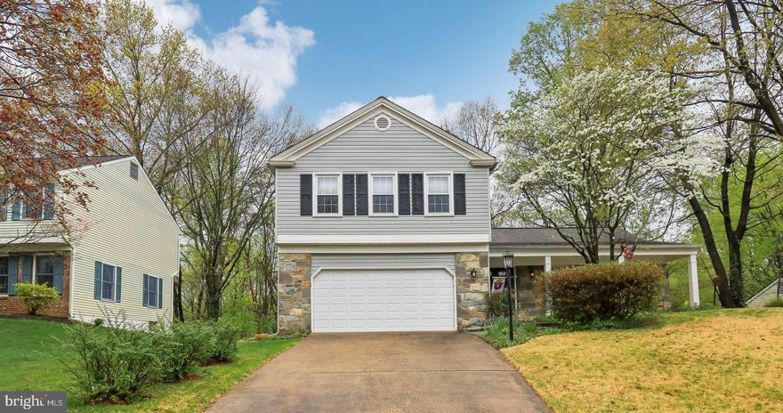 Welcome Home to Montclair!***Assumable VA Loan 4.625%***
This beautifully maintained home offers 4 bedrooms, 3.5 bathrooms, and over 2,800 square feet of living space across four spacious levels. Perfectly situated on a wonderful lot with serene wooded views of the golf course, this property combines comfort, style, and convenience.

Step into an inviting open floor plan featuring a chef’s kitchen with stainless steel appliances, seamlessly flowing into the cozy living room with a fireplace(The chimney has been recently relined). Enjoy indoor-outdoor living with access to a charming screened-in deck that leads down to a beautifully designed stone patio—ideal for entertaining or relaxing.

Upstairs, you'll find an oversized owner’s suite with bath, along with three additional bedrooms and another full bath. The finished basement adds even more versatility with a spacious living area, a dedicated office space, and another full bathroom.

Montclair offers unbeatable amenities including a private lake with three beaches, tennis courts, playgrounds, walking trails, a dog park, and a golf course. Conveniently located near the VRE, express commuter bus service to the Pentagon and Washington, DC right around the corner from the home, and with easy access to Route 234 and all the shopping, dining, and entertainment in Dumfries and Woodbridge—this home truly has it all!