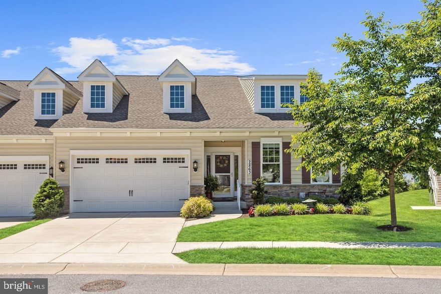 Beautiful End of Group "Villa" in Popular Castlefield!  Open Concept Floor Plan.  Features Include Crown Molding Throughout the Main Level, Lots of windows, Spacious Living Room with a Gas Fireplace; The Eat In Kitchen Has Beautiful Granite Countertops , Plenty of Cabinets, Stainless Steel Appliances, Breakfast Bar, Breakfast Room, Butlers Pantry and Access to Covered Deck.  The Master Bedroom Has a Custom Walk-In Closet, Full Bathroom with Double Vanities and Beautiful Walk In Shower.  There is Another Bedroom on the Main Level with Access to Another Full Bathroom.  A Full Laundry Room is Also on the Main Level with Access to the 2 Car Garage.  The Lower Level has a Huge Family Room Area with Beamed Ceilings, A Bedroom, Half Bath, Workshop and Storage Area.  Sliders Open to Walk Out Ground Level. The Community Has a Beautiful Pavilion that is Great For  Family Gatherings.  This is an Amazing Property!