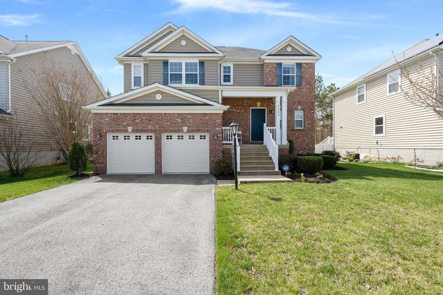 BIG BOLD BEAUTY! Come take a look at this immaculate brick front beauty, situated on a perfect lot! You'll immediately be captured by the beautiful landscaping and cozy front porch. Enter the home where you'll notice the open floor plan with hardwood throughout.....perfect for entertaining. The gourmet kitchen is equipped with granite counters, a breakfast bar, stainless steel appliances, double wall oven, and a pantry. The breakfast area off kitchen is the perfect place for your morning meals. The family room features a gas fireplace, where you can cozy up on winter nights. Formal living room is great for those special occasions or holidays. Upstairs boasts 3 spacious bedrooms, a loft, 2 bathrooms, and the laundry. The primary bedroom has a large walk in closet and a luxury bath complete with soak tub, dual vanities, and a separate shower. The loft is big enough to easily be converted to a 4th bedrooms, still giving space for an office, play area, etc. Make your way downstairs where you'll see a large rec room, kitchenette, 4th bedroom, and a full bath. Out back the deck overlooks the fully fenced backyard that backs to trees. The 2 car garage has auto openers, and is wired for an electric car charger! Conveniently located a short drive to restaurants, shops, theaters, dining, and more.... and easy access to main highways for easy commute to DC and surrounding areas. This home will sell itself....just open the door! SEE AGENT REMARKS.