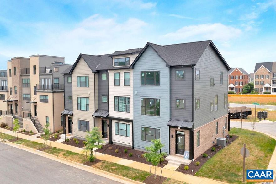 Under construction.  July Delivery. The Bainbridge, a light filled 22' wide townhome thoughtfully designed for an efficient use of space. The entry level includes a study, bath, & attached two car garage. The open main level is perfect for entertaining w/ great room, fireplace, dining, kitchen w/ 9' island, covered deck, & 1/2 bath. The 3rd level consists of the primary suite w/ vaulted ceiling, dual vanity hall bath, two additional bedrooms, & side by side laundry. END UNIT with TEN additional windows. Premium location in the heart of Old Trail fronting green space, across from 18 acre Western Park, steps to dining, coffee shop, the pool, golf, walking trails, schools & more! Every home is Pearl GOLD Certified and HERS scored by a third party to ensure quality, comfort, & energy efficiency. Similar photos.,Granite Counter,Maple Cabinets