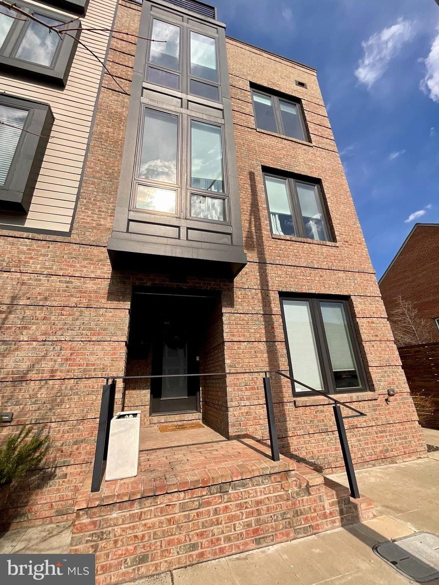 Welcome to 1023 Pendleton St, a beautiful end-unit ideally located in Old Town Alexandria, just blocks to the Braddock Street metro! Built in 2018, this gorgeous home features 4 levels and wood floors throughout, offering floor-to-ceiling windows that provide plenty of natural light. Enter via the Lower Level, which includes a Foyer, Office, and access to the 2-Car Garage. The Main Level is open concept with a gorgeous Kitchen that includes an expansive island, stainless-steel appliances, quartz countertops, and a pantry. The Dining Room offers ample space for entertaining, and the Living Room has a wall of windows that produces even more brightness. A Powder Room completes this level. Upper Level 1 includes a lovely Primary Suite with a large bedroom, walk-in closet, secondary closet, and bathroom. The Primary Bathroom features a double vanity, free-standing shower, and water closet. An additional Bedroom with en-suite Bath ties the level together.  Upper Level 2 offers even more space with a Rec Room/Office Space and Bedroom with En-suite Bathroom. This level also leads to an amazing Rooftop Terrace that provides stunning views of the city. Just 3 miles to Reagan National Airport, 0.5 miles to Braddock Street metro station, 0.8 miles to King St metro station. Half a mile to the Alexandria Waterfront. Easy access to the GW Parkway and Route 1. Available for a 12-36 month lease. Pets case by case.