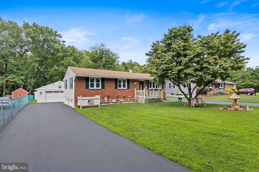 WOW!   Beautiful and meticulous home sitting on just under a half-acre in a parklike setting.   Enjoy one floor living in this Ranch Style home with 4 bedrooms, 2 full baths and a detached 2. 5 car garage.  Current owners have spared no expense with a long list of upgrades.  Newer Kitchen is sure to please plus an updated and expanded Full Bath.  Recent upgrades also include a newer HVAC system, Deck, and Roof.   The Floor Plan is Perfect!   First Floor Features include:  Living Room with Newer Carpet, Dining Room, and an enlarged Kitchen with sliders leading to an inviting deck that overlooks the large back yard.  Main Level also has 3 Bedrooms, 1 Full Bath and a Mud Room.  Basement is totally finished with a really nice Family room, Bar, Fireplace, Half Bath, Laundry Area and possible 4th Bedroom that would also make the perfect office.  There are two driveways so plenty of guest parking.  Ideal location for commuters- close to Philly, Wilmington and major highways.   Pack your bag and move right in.   Sellers have truly lovingly maintained this home like no other!   Rare opportunity for a great single home on a fantastic lot.  No disappointments here - Come Take a Look!   Offer deadline 4/23 at 7:00pm.