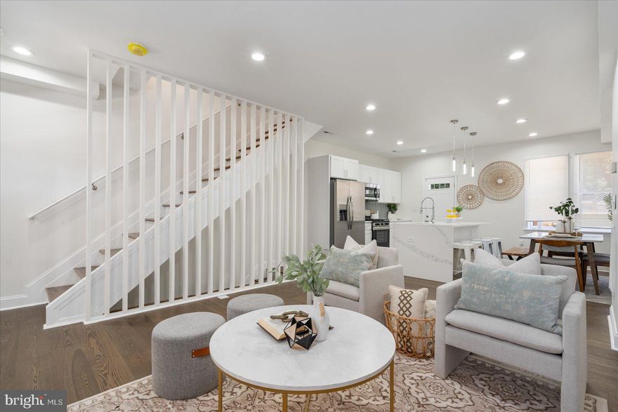 Completely renovated 3 bedroom /3 Bathroom  brick Townhome located in this quiet neighborhood.  Walk up to the covered front porch with stately columns and a beadboard ceiling and open the door into your forever home.The open concept main floor boasts tons of natural light, easy care flooring, a large living room, dining area and stunning kitchen.  The kitchen boasts plenty of cabinets, stainless steel appliances, quartz countertops with an elegantly designed backsplash, a deep stainless sink set into a large island featuring a waterfall edge with breakfast seating for four and pendant lighting.  On the second floor is a large bright primary suite featuring a private full bath with a walk-in shower, a large secondary bedroom, a sizable third bedroom, and a beautifully tiled full bath.  The lower level adds additional living space with a large family room, a full bath with a beautifully tiled walk-in shower, laundry, storage, and a walk-out to the fenced yard.  From the kitchen step outside to a newly constructed deck that overlooks a yard filled with tons of possibilities. This home is move-in ready with so much to offer new homeowners and is located in close proximity to shopping, restaurants, and commuter routes.