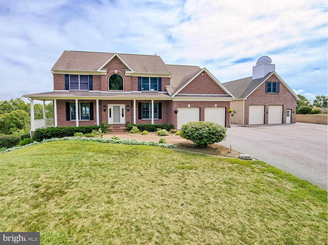 AMAZING 4 bedroom colonial w/ breathless views from all sides of this custom built home. Amenities include gourmet kit. w/ granite counters & ceramic tile. Brazilian Cherry wd floors in Livg & dining room. Huge master suite w/ 2 walk in closets & gas fp. Jacuzzi tub & sep.  shower in master bath. Fin.lower level, 3 levels of decks w/ pool, gardens, water falls, sep. work shop w/ gar. YOU MUST SEE!