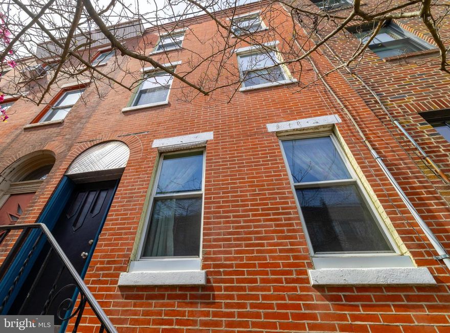 Step into this expansive 6-bedroom, 2-bath home, a unique opportunity nestled on one of Passyunk’s most desirable streets. Located within the coveted Fanny Jackson Coppin school catchment and adjacent to  redesigned Columbus Square, this property offers charm, awesome location, large square footage and tones of potential.
With its original brick front and preserved architectural details—such as vintage doors, moldings, and railings, high ceilings and large rooms—this home exudes character while presenting a blank slate for your vision. The large backyard is a rare find, ideal for entertaining or creating your private oasis.
While the home is in need of cosmetic updates, it boasts great development potential for those looking to create something extraordinary or move right-in a grand charmer! Its prime location provides convenient access to Center City, vibrant Passyunk shopping, schools, and public transportation.