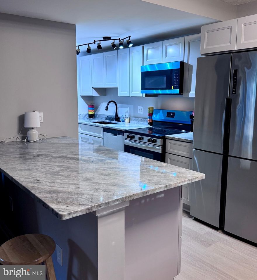 Coming Soon!
Completely remodeled in 2025!  Enjoy the wonders of one floor living in fantastic move-in ready condo with detached one car garage and fenced in courtyard in Crofton. Laminate flooring, granite counters in kitchen.  All new appliances. This a must see!