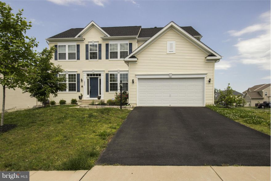 Stunning center hall colonial with spacious open floor plan, huge rooms, and wonderful gourmet kitchen. Large corner lot gives you lots of room to spread out but little traffic to be concerned. Hardwood floors throughout the main level, large trex deck with white vinyl rails, grill, poker table, and side by side refrigerator in garage convey with home. New roof.