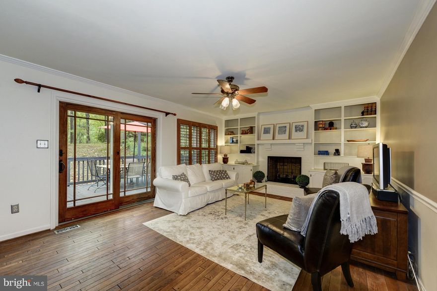 Stunning home in Reston has it all: 5 BR, 3.5 BA, almost 3,000 Sq.Ft, Gourmet Kitchen w SS appliances, Formal DR & LR, FR w/ built-ins & FP. Fully Finished Basement w/ office, gym, BR, Full Bath, Laundry, & Living area with wine fridge, granite counters, cherry cabinetry, & surr sound. HW Floors, Porcelain Tile. New MBA.  New Siding 2013, new Furnace 2013, Roof replaced 2007.