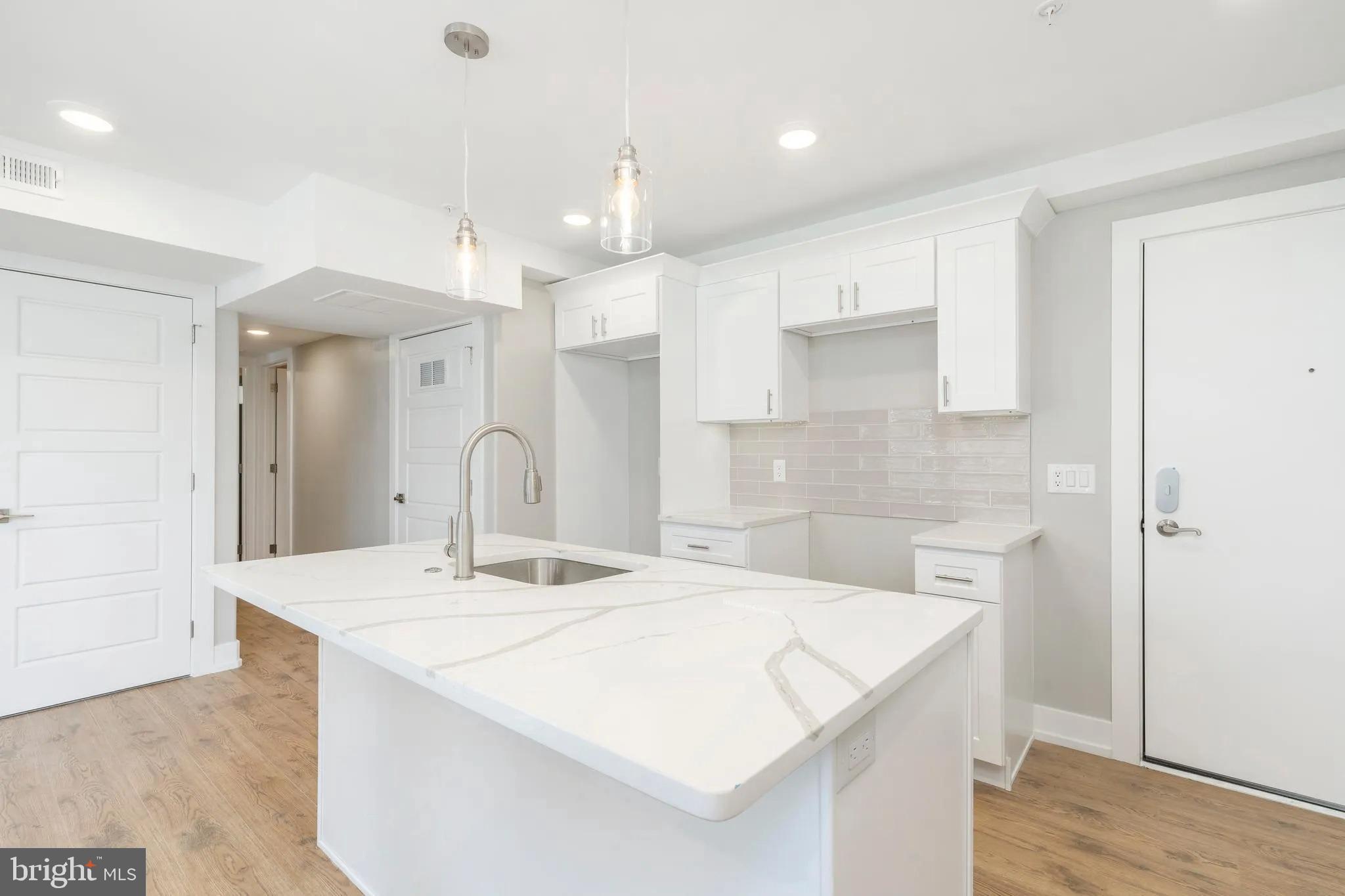This gorgeous 2 bed/1 bath apartment is minutes away from Temple University, or Center City. campus and nestled in between all of the medical and educational facilities located in and around the North Broad St corridor. The building consists of 11 residential units. Unit (Unit #100) features 2 bedrooms and 1 full bathroom and a huge living room area with spacious bedrooms. Building amenities include: 24 Hour building security, Wireless Key Entry to Building & Apartments, Amazon & UPS Parcel drop off for secure deliveries, Surround Sound in unit audio, In-Unit Washer & Dryer, Quartz Countertops, Rooftop Access to All Tenants, Stainless Steel Appliances and Under Cabinet Kitchen Cabinet Lighting. One secured parking spot available for an additional $150 in the secured garage area! Call us to schedule a tour.