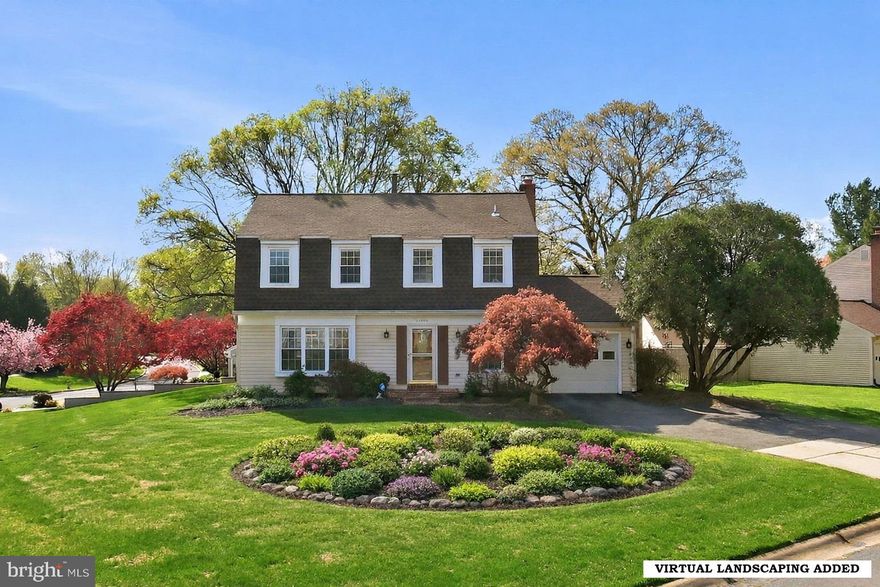 Welcome to 11300 Freas Drive, a classic colonial in the Westleigh community of North Potomac, ideally sited on a .25-acre corner lot. With 2,674 total square feet, four bedrooms, two full bathrooms, and a powder room, this home combines a traditional layout with comfortable everyday living, open gathering spaces, and inviting outdoor areas. The home offers resilient luxury vinyl plank flooring throughout. The setting is enhanced by a level backyard with green space, garden beds, and a large rear deck that extends the living area outside. Step inside to a bright interior with an easy, functional flow. The centrally located kitchen serves as a natural hub for daily living and is appointed with stainless steel appliances, Corian countertops, and a garden window. It opens directly to the family room, creating a comfortable setting for casual gatherings. In the family room, a wood-burning fireplace with a brick mantel adds warmth and character, while sliding glass doors lead to the rear deck for seamless indoor-outdoor living. A formal living room and dining room, a powder room, and a laundry/mudroom with access to the one-car attached garage, complete the main level. Upstairs, the luxury vinyl plank floors continue throughout all four bedrooms. The primary suite includes a walk-in closet and an en-suite bathroom with a contemporary vanity and walk-in shower. Three additional bedrooms share a hall bathroom updated with a modern vanity and a tub-shower combination. The upper level balances private retreat space with flexibility for family, guests, or work-from-home needs. The lower level adds valuable finished space that can easily serve as a lounge, exercise room, office, playroom, or media area, depending on your lifestyle. A large utility and storage room provides practical space for organization and long-term storage. Located in North Potomac, this home enjoys access to shopping, dining, entertainment, parks, recreation, and major commuter routes. Combining a desirable neighborhood setting, functional living space, top-rated schools, 11300 Freas Drive presents a wonderful opportunity in the Westleigh community.
